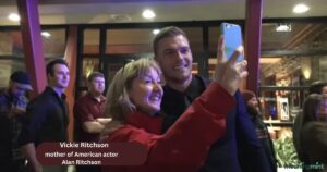 Vickie Ritchson A warm and inspiring portrait of Vickie Ritchson, a dedicated high school teacher and military wife, smiling confidently while mentoring students. Her influence on education and family values shines through. The image highlights Vickie Ritchson’s role in shaping young minds.